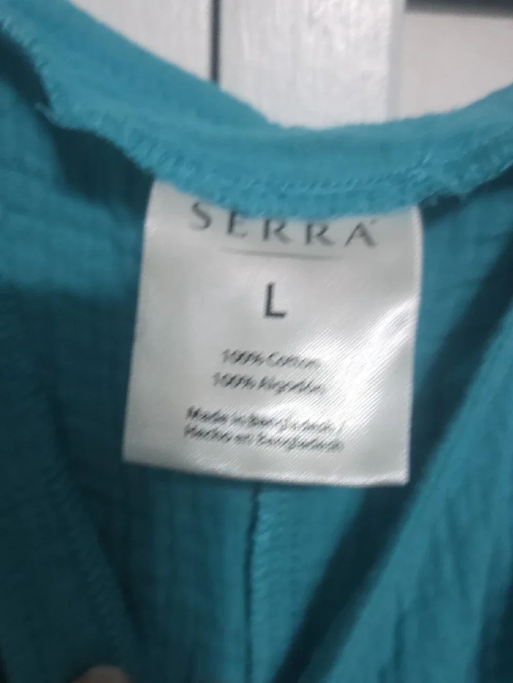 Serra Teal Sleeveless Romper with Button Front